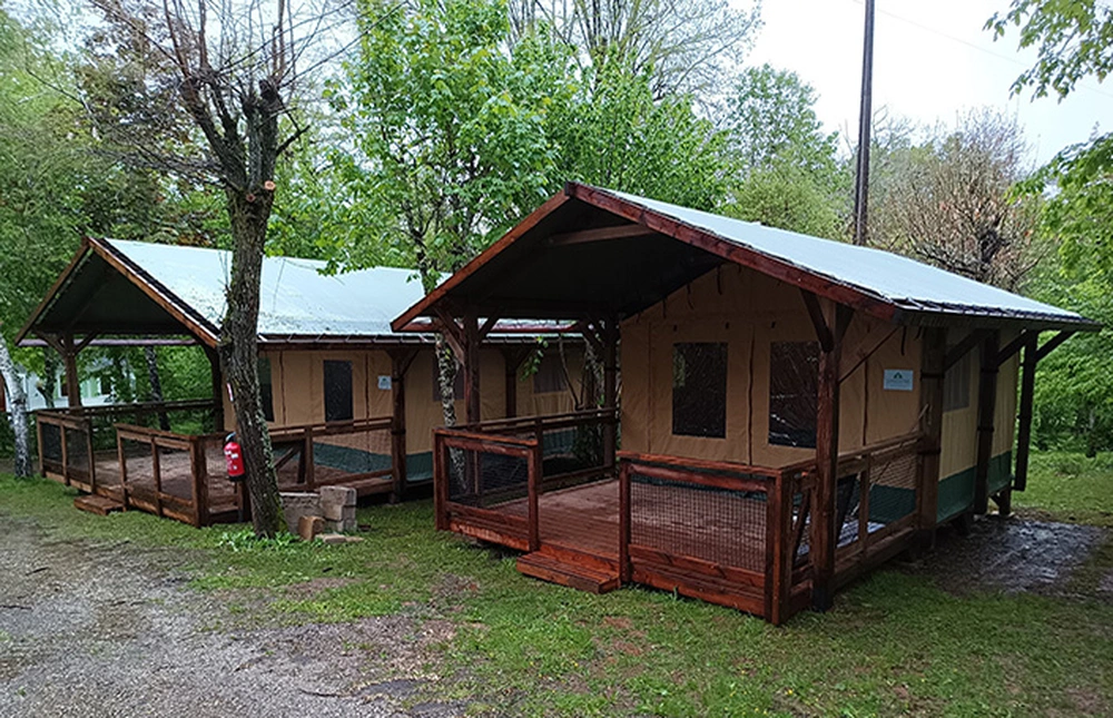 Safari Suite Tent with spacious terrace and elegant design, perfect for luxury camping.