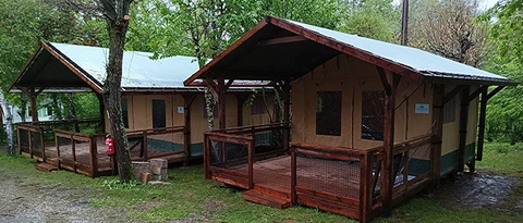 Safari Suite Tent with spacious terrace and elegant design, perfect for luxury camping.